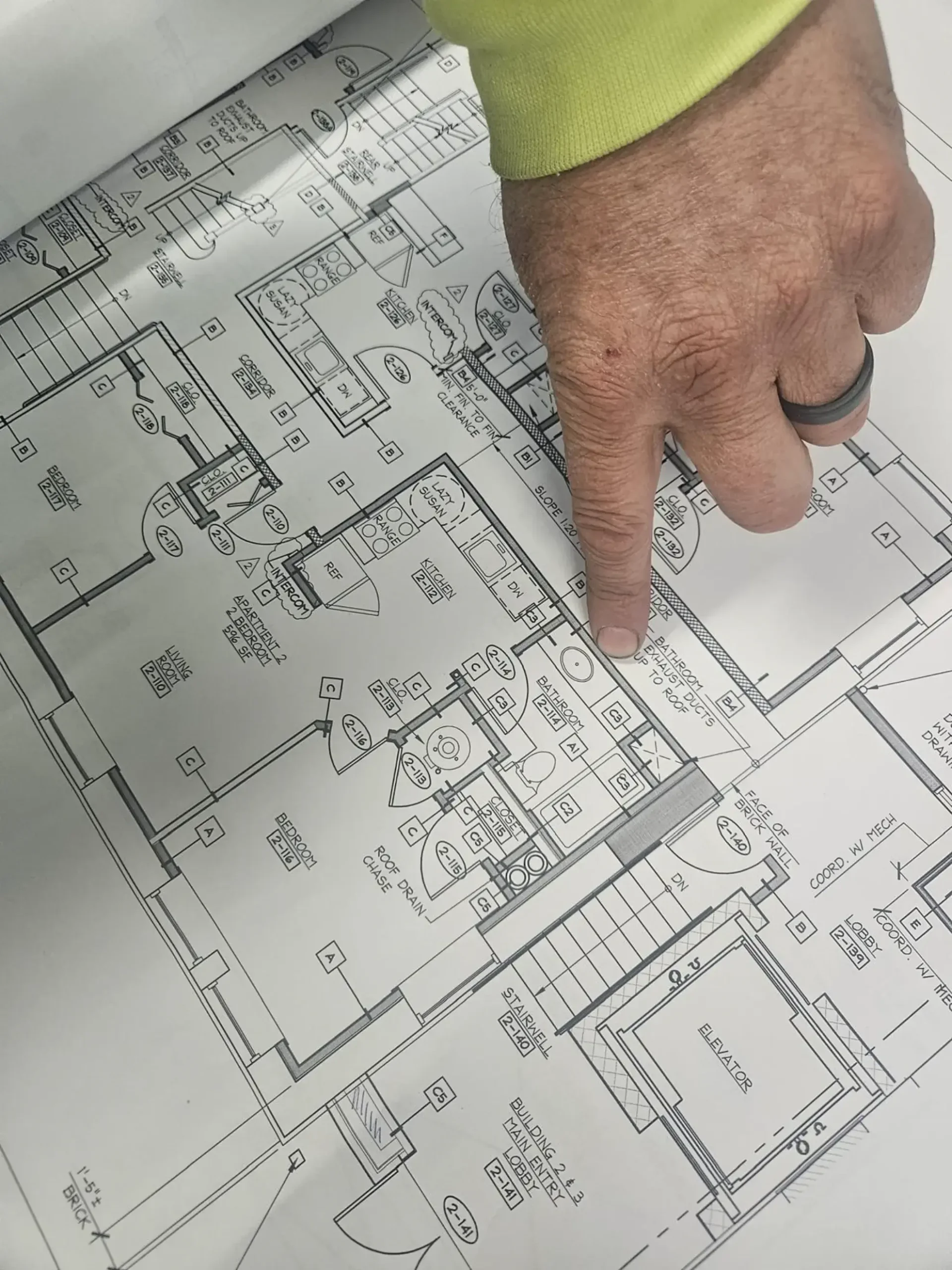 Carpentry contractor installing exterior trim on a New York home