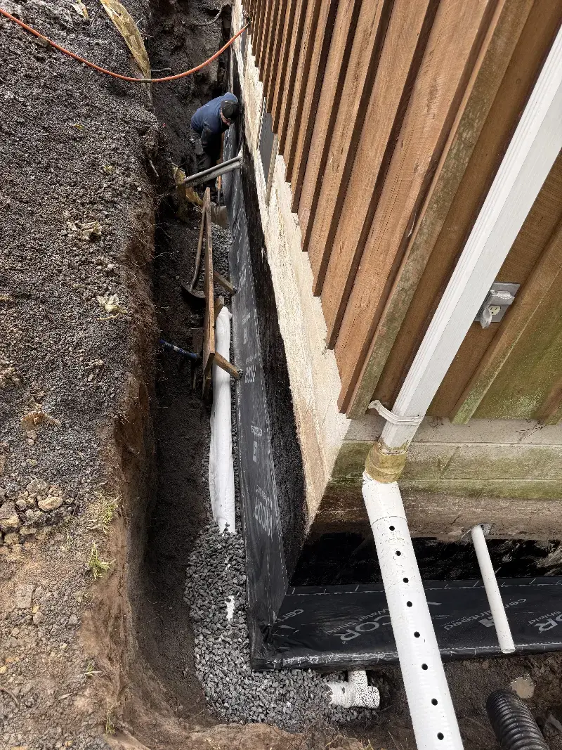 Downspout drainage connected to a buried line
